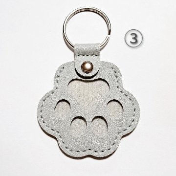 肉球の小物入れキーホルダー(黒系)の画像