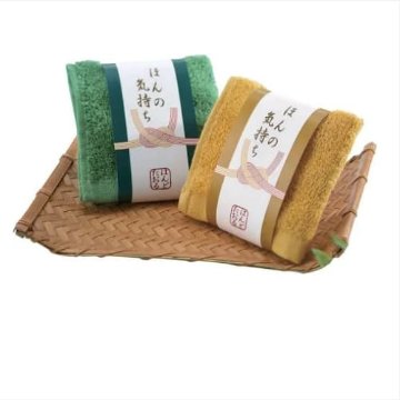 ギフト・販促用「ほんの気持ちハンドタオル」（紙帯巻きOP袋）100個セット・透明袋入り・綿・2色取り混ぜの画像