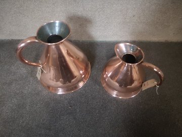 Two large copper jugs画像