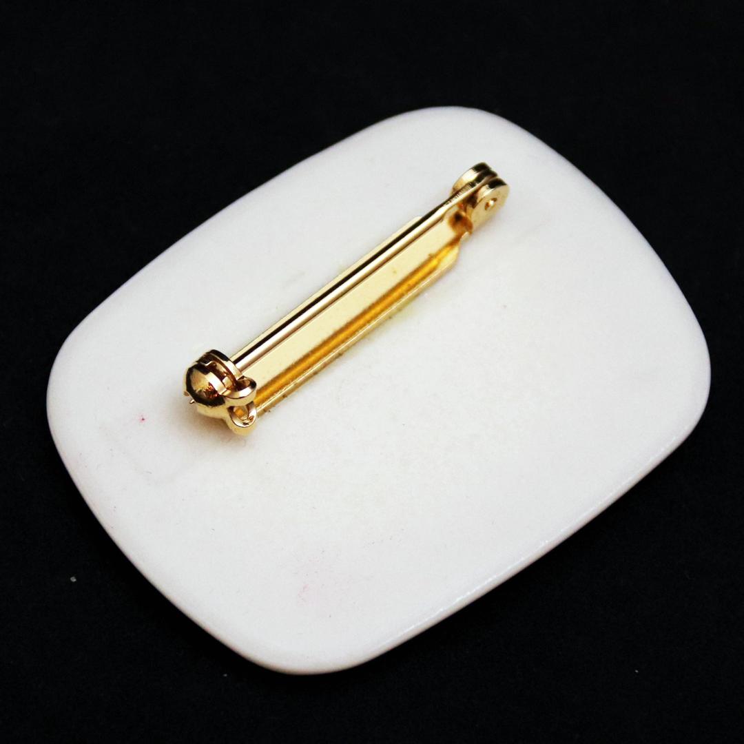 アメリカ AVON ポーセリン クリスマスブローチの画像