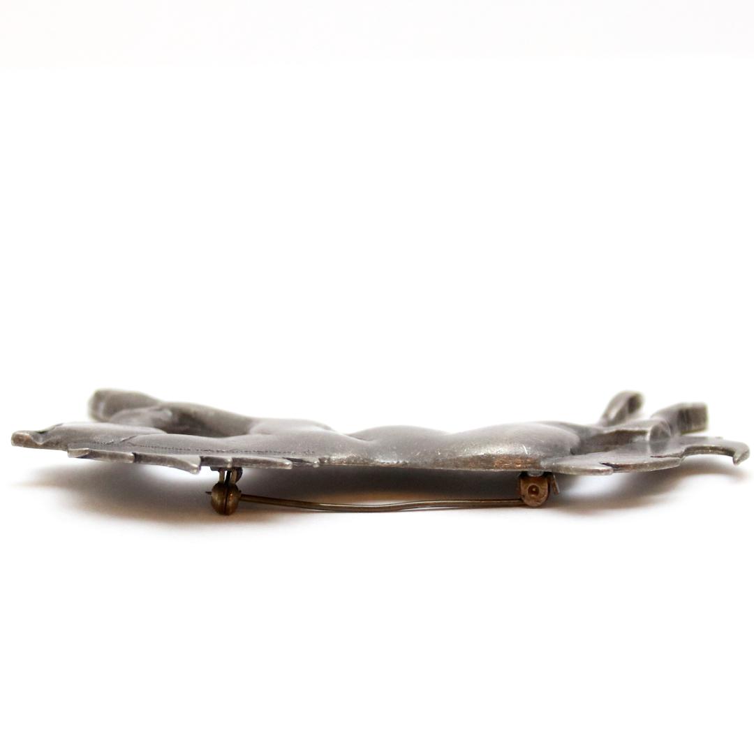 ヴィンテージ ピューター リーピングホースブローチの画像