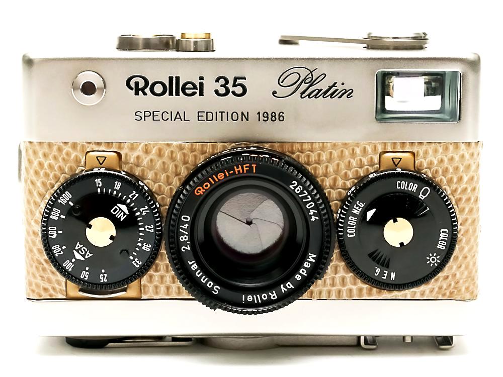 Rollei 35 platin (プラチナ) Germany 製 40/2.8 Sonnar HFT (沈銅式) Cdsメーター内蔵.レンズシャッター 本革カメラケース&リストバンド付、  新品同様の画像