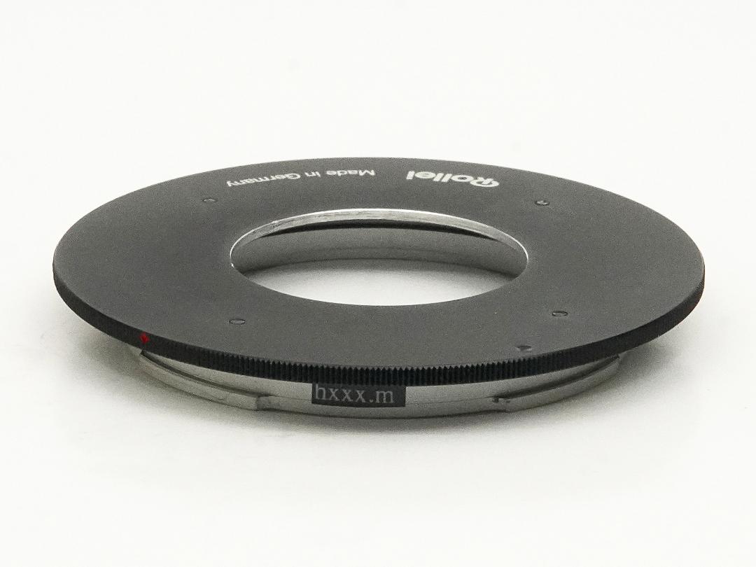 アダプターRing 、大判の0番shutterレンズを →  RolleiSL66、66E、66SE で使用します。Rollei 純正品の中古品の画像