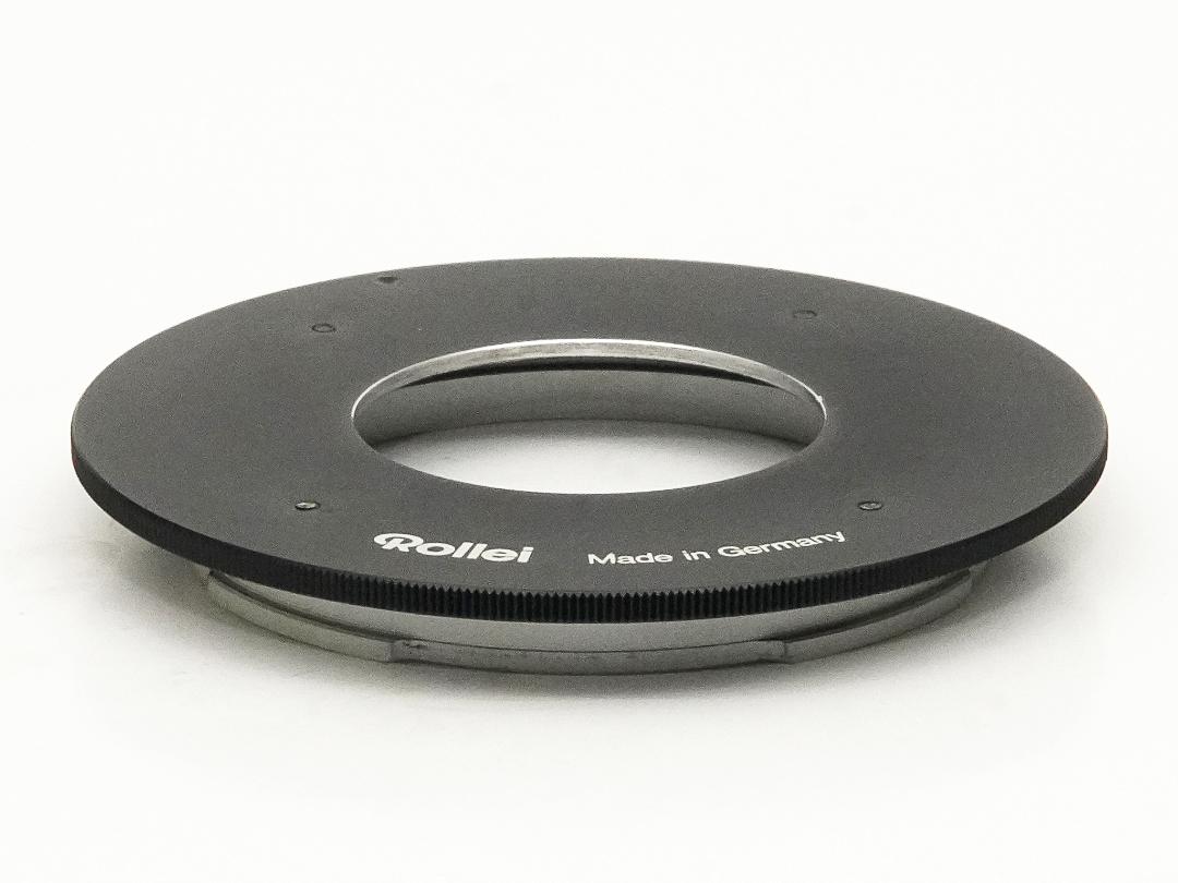 アダプターRing 、大判の0番shutterレンズを →  RolleiSL66、66E、66SE で使用します。Rollei 純正品の中古品の画像