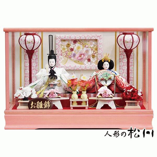 ハート柄の衣裳を着つけた可愛いピンク塗雛人形ケース飾り/人形の松川