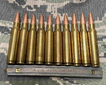 USED・ダミーカート（薬莢）・米軍放出品　5.56mm弾頭付き　10個　クリップ付きの画像