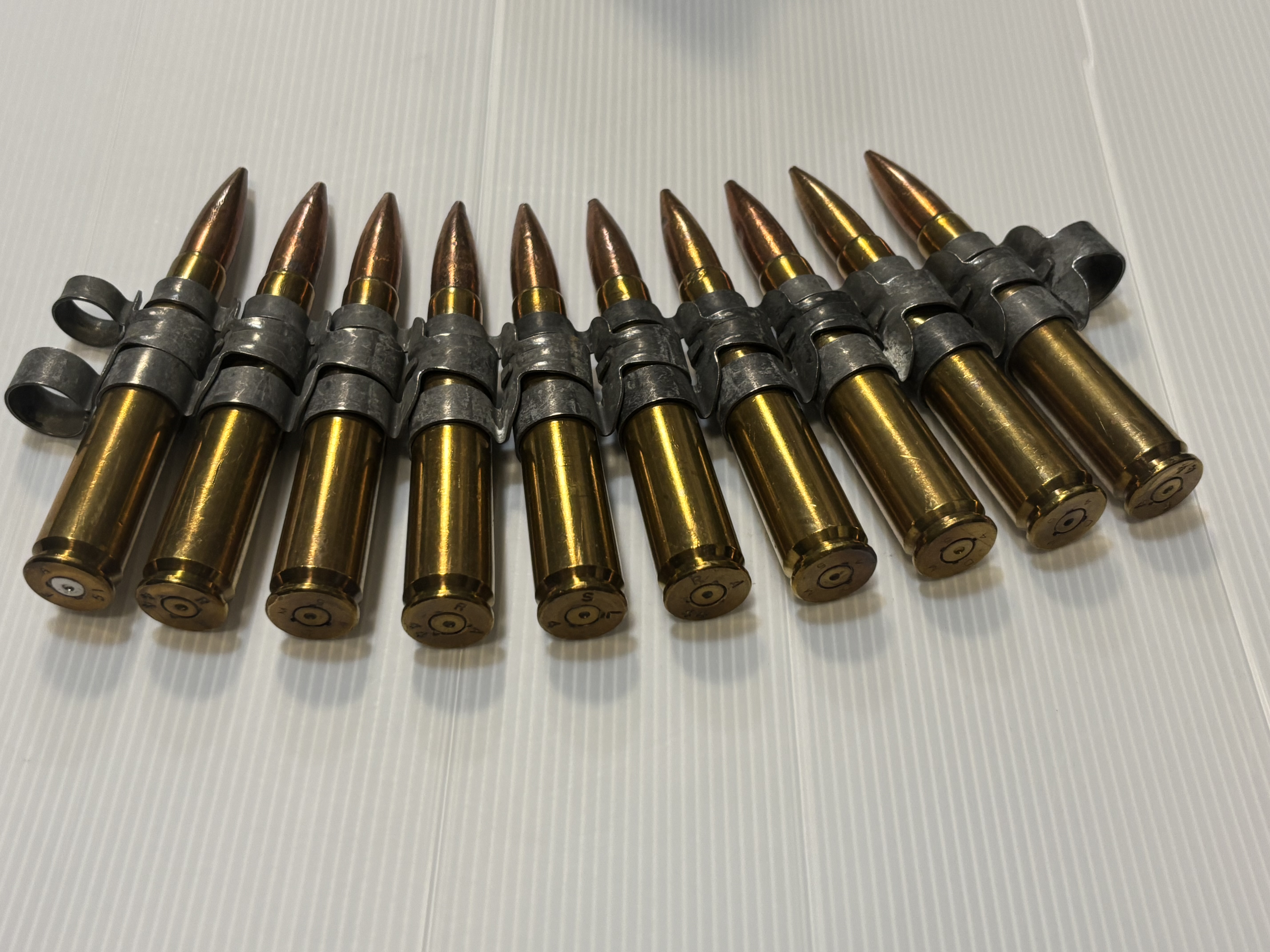 USED：米軍放出品　12.7mm 50CAL 50BMG 50口径　ダミーカート　10連　ベルトリンクの画像