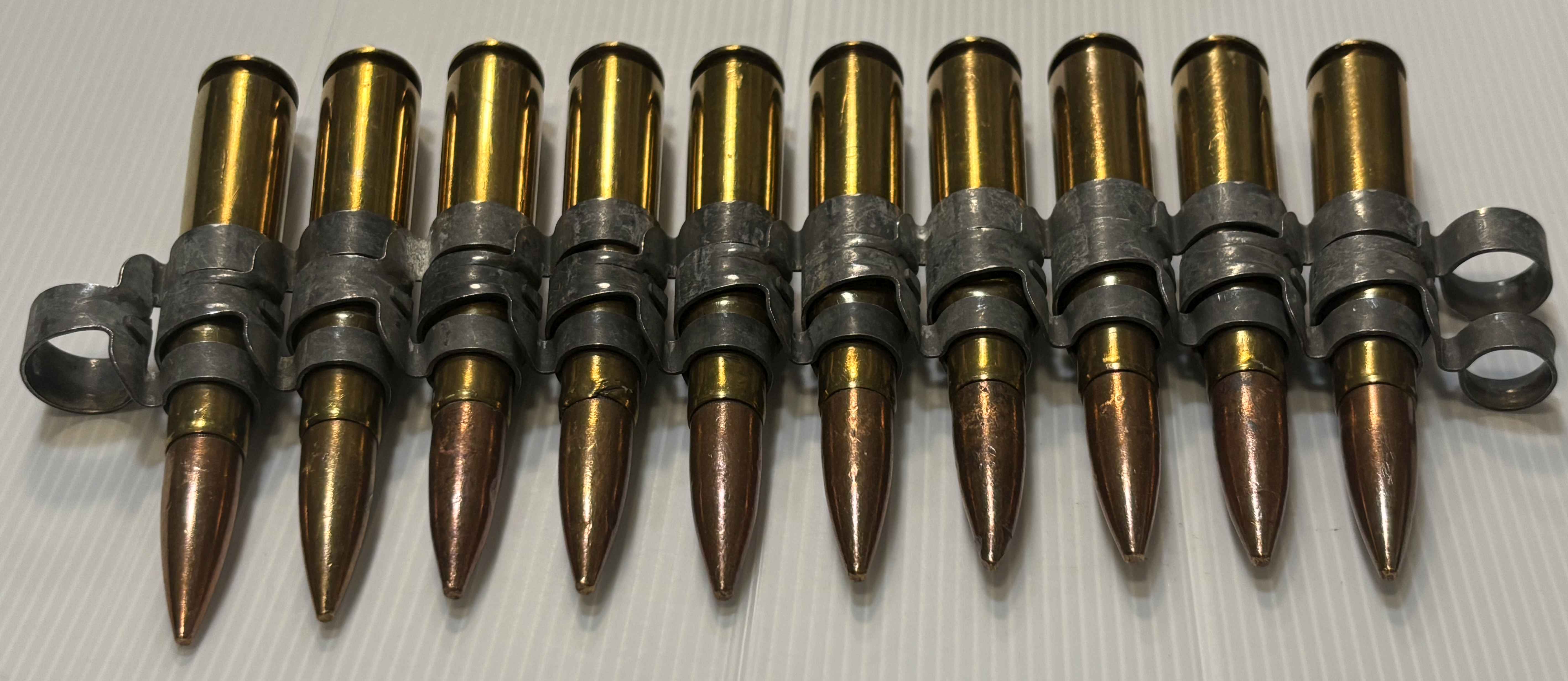 USED：米軍放出品　12.7mm 50CAL 50BMG 50口径　ダミーカート　10連　ベルトリンクの画像