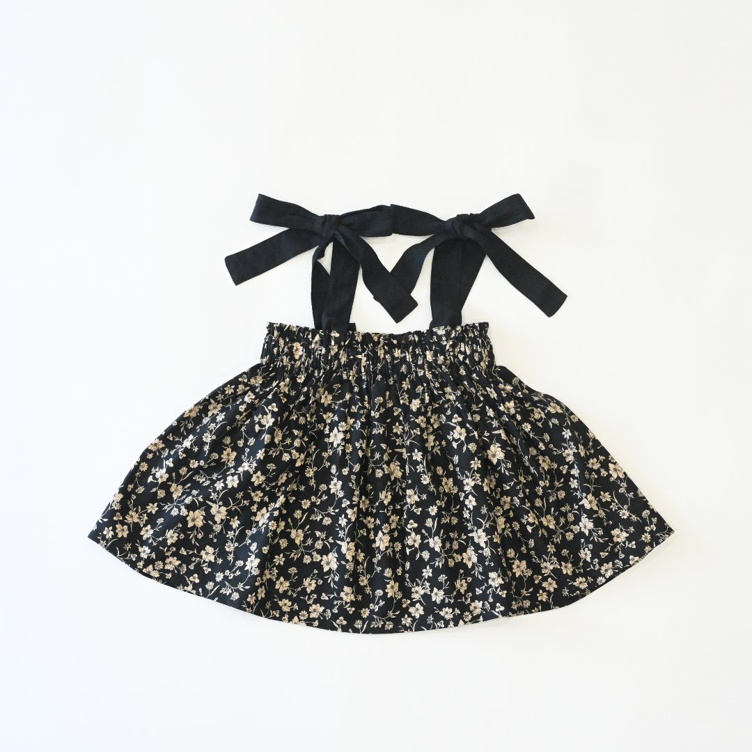 子供服ブランド「プチミグ」の夏の子供服日本発子供服ブランド「プチミグ」ノースリーブトップスキャミソール小花柄シックなブラック90サイズと100サイズの画像