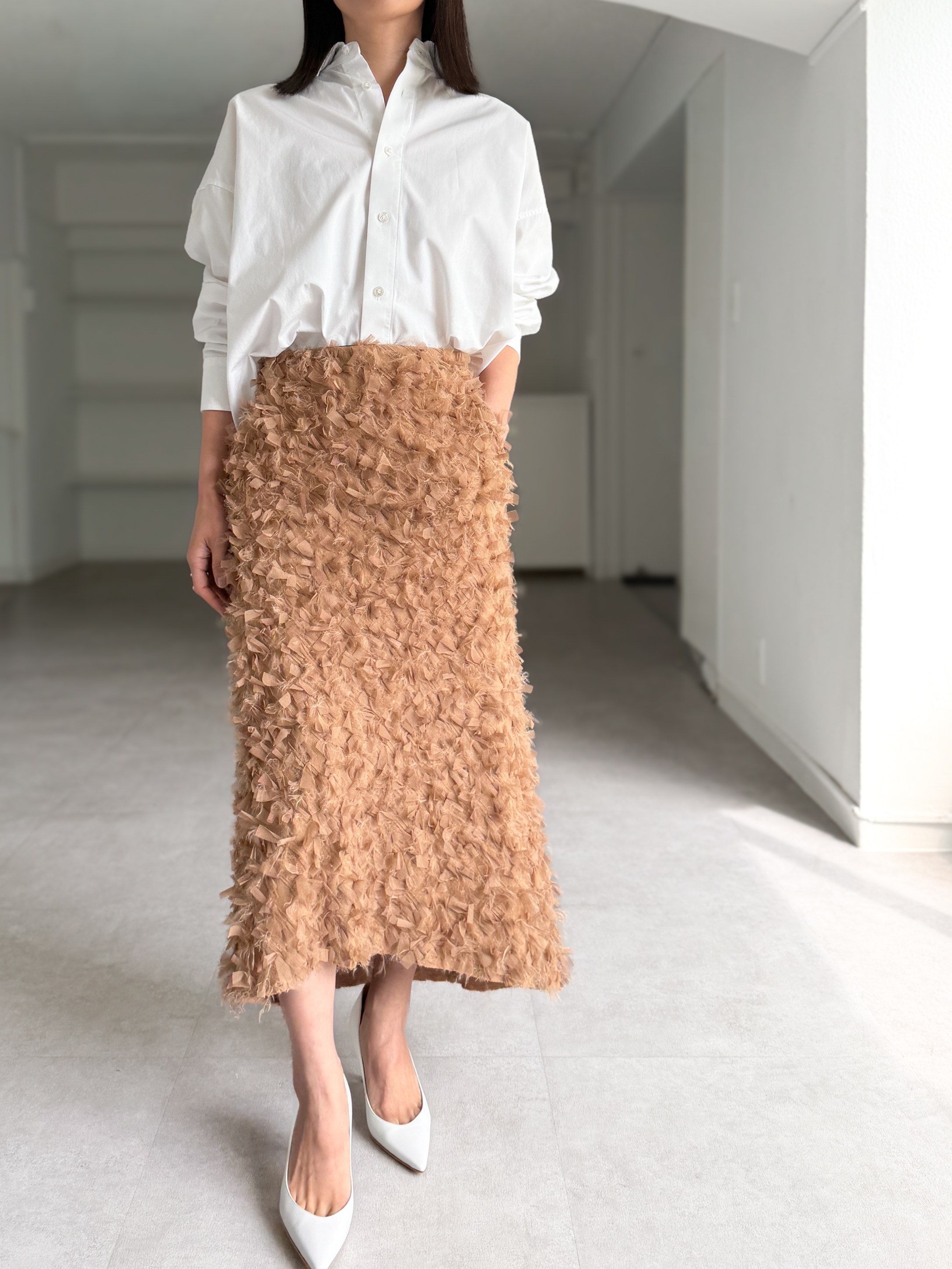 Odile Feather Cappuccinoの画像