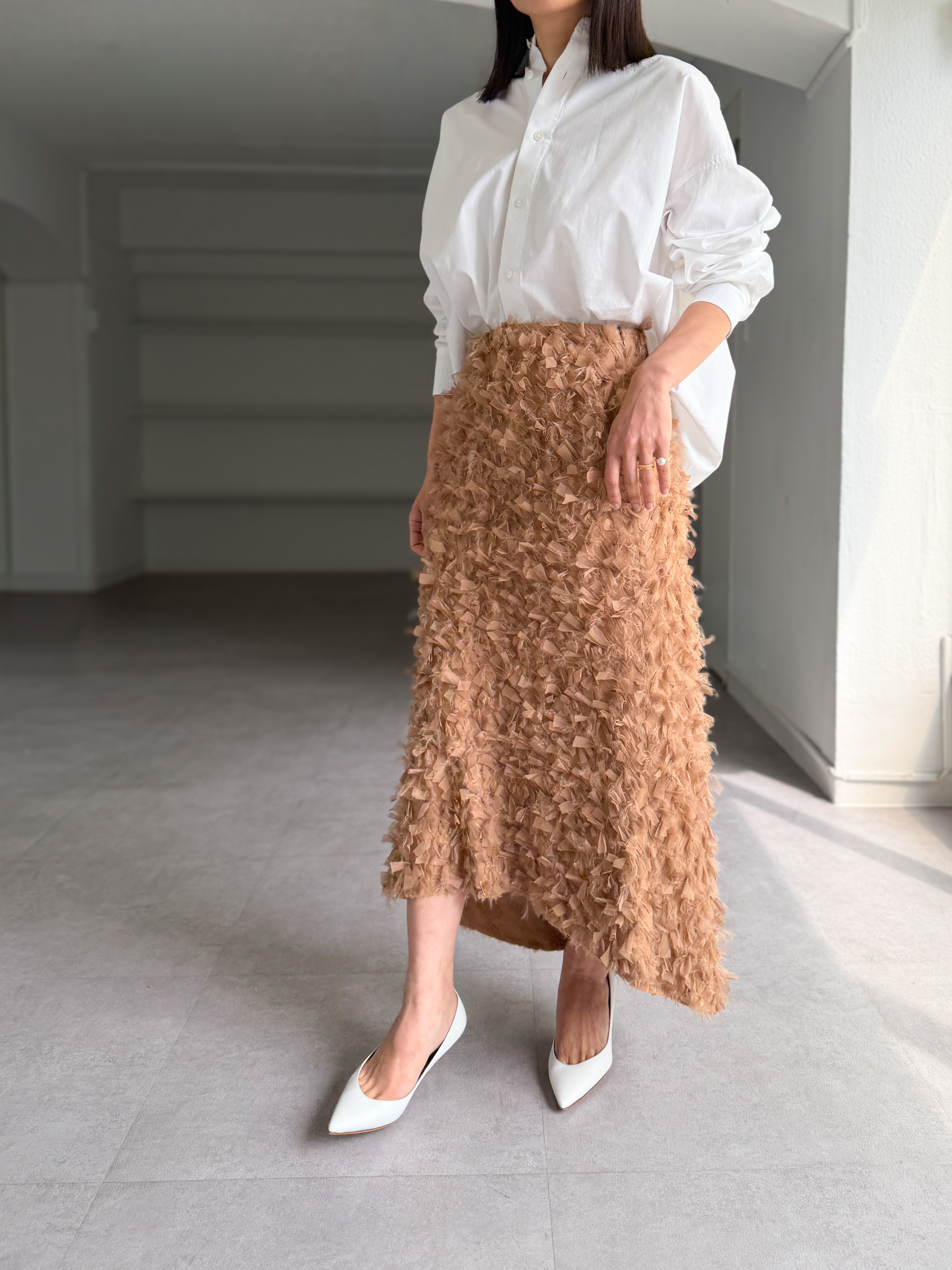 Odile Feather Cappuccinoの画像