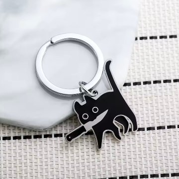 包丁を咥えた猫キーホルダーの画像